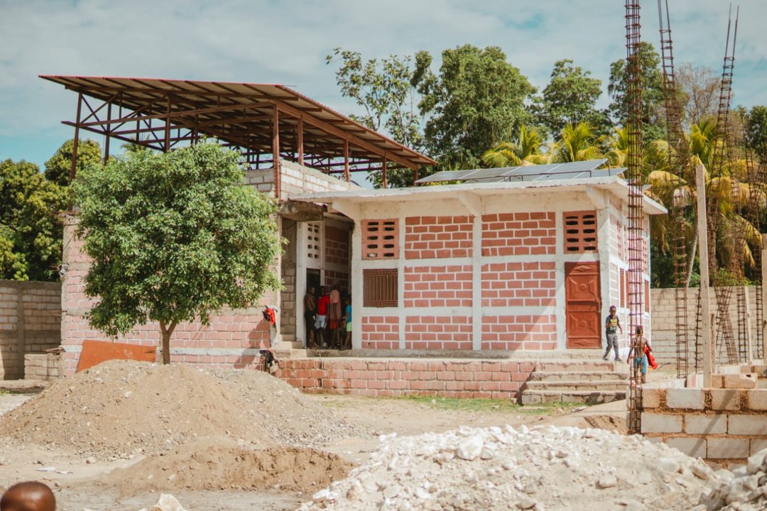 The new PAH building under construction, with solar panels on the roof
